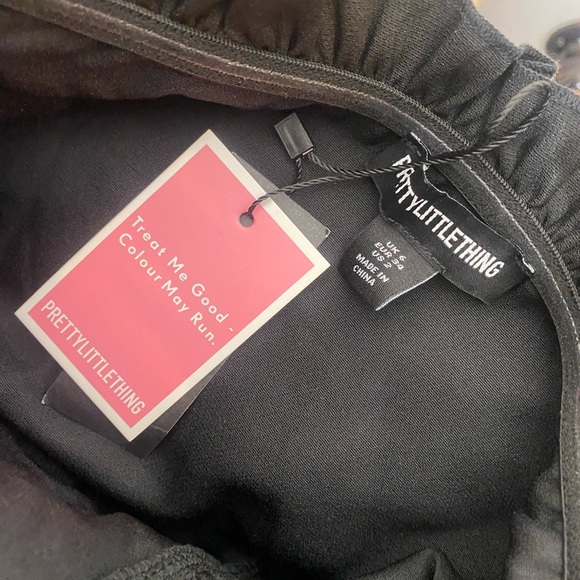 PrettyLittleThing Black Woven Frill Peplum Flared Jumpsuit Size 2 Nwt - Picture 7 of 8